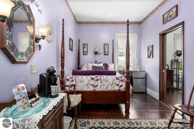 bedroom featuring dark wood-type flooring