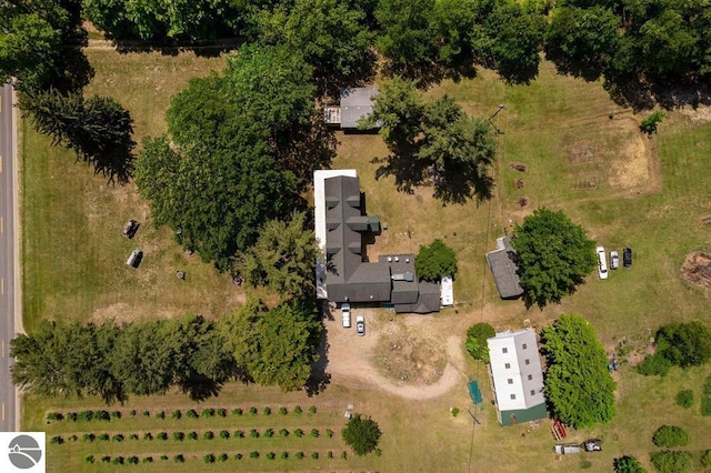 birds eye view of property with a rural view