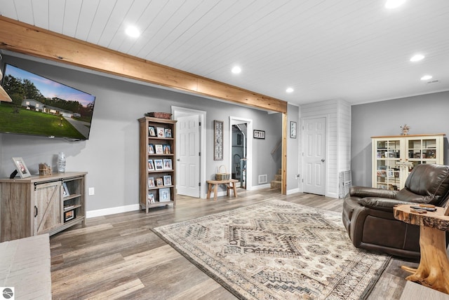 living room with wood ceiling and hardwood / wood-style flooring