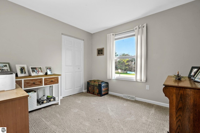 home office with light carpet