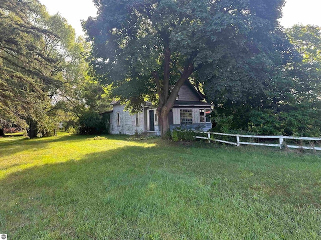 exterior space with a front yard