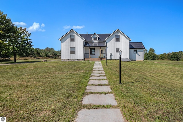 modern inspired farmhouse with a front yard