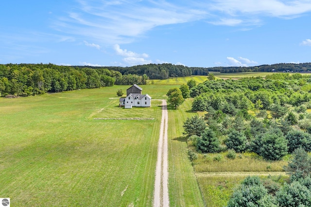 birds eye view of property with a rural view