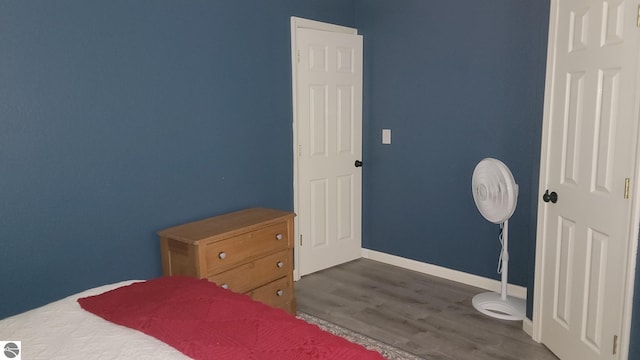 bedroom featuring dark hardwood / wood-style floors