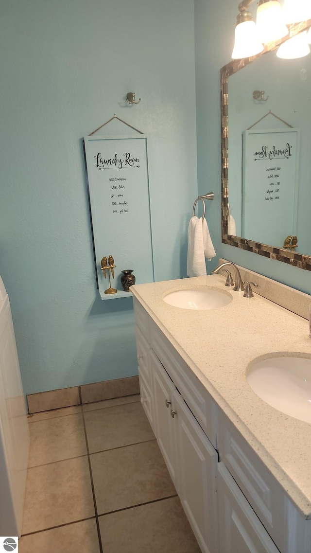 bathroom with vanity and tile patterned floors