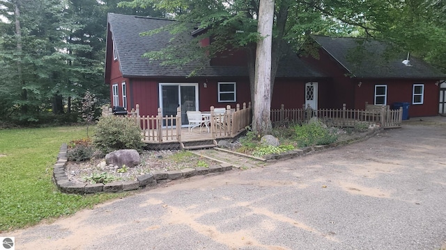 view of front of property featuring a deck