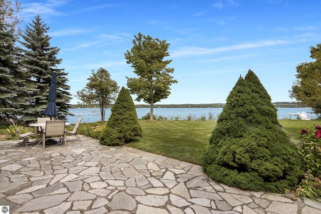 view of patio featuring a water view