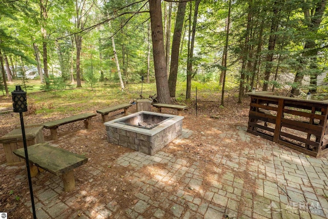 view of patio featuring a fire pit