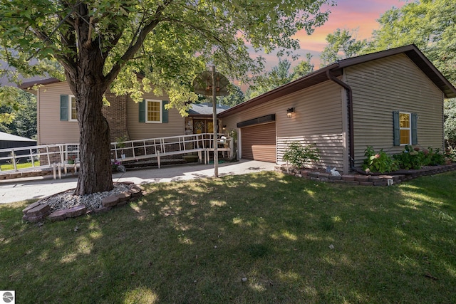 view of front of home featuring a yard