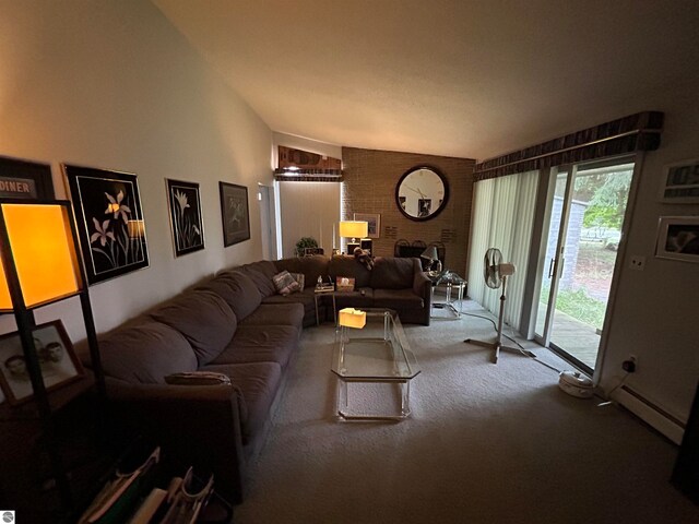 living room featuring lofted ceiling, baseboard heating, and carpet flooring