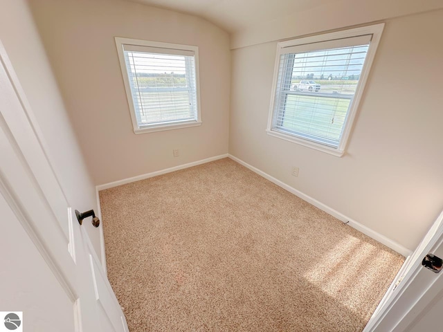 unfurnished room with carpet floors