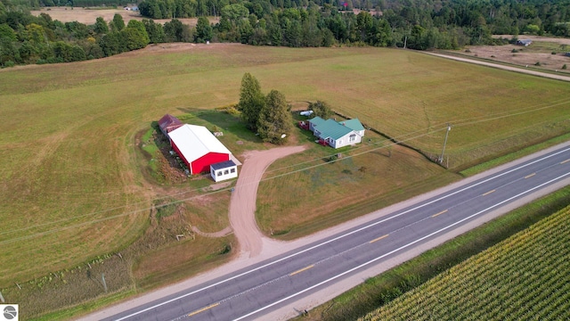 birds eye view of property featuring a rural view