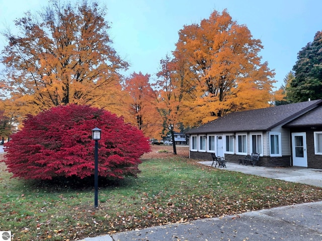 exterior space with a yard