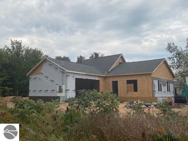 view of property exterior with a garage