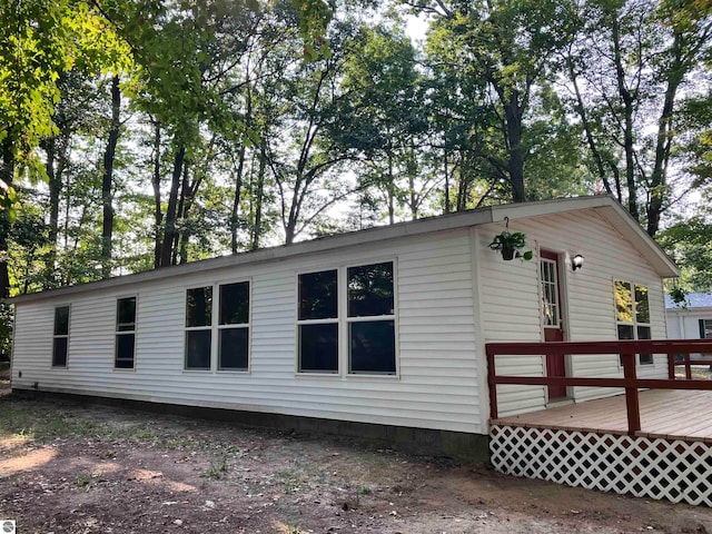 exterior space with a wooden deck