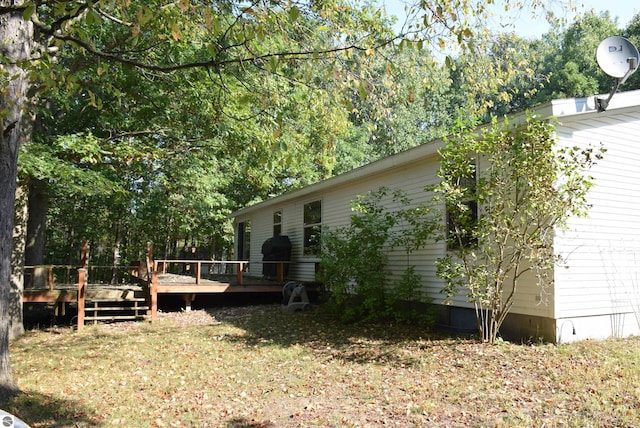 view of yard with a deck