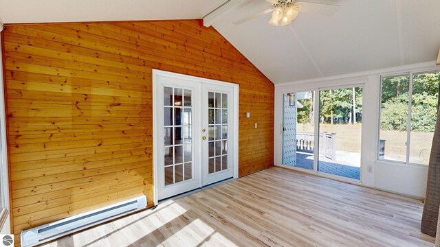 view of front of property with a sunroom and a front yard