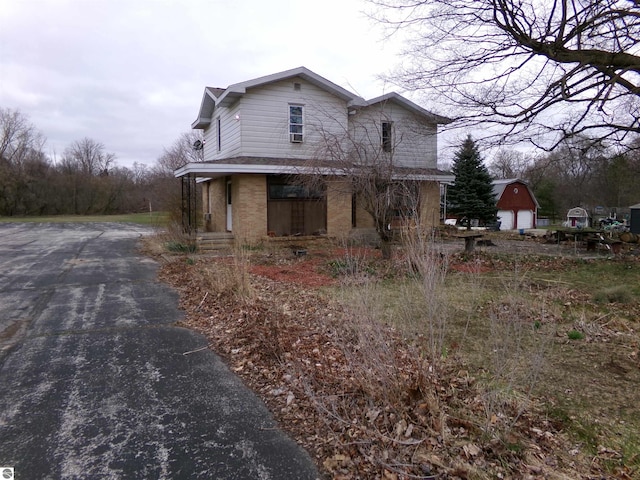 view of front of home with an outbuilding