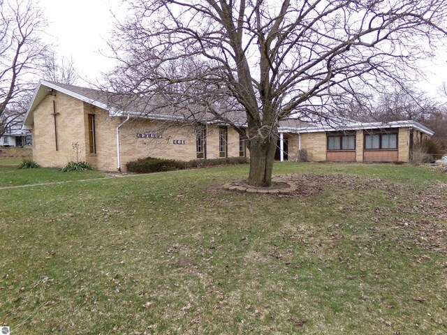 exterior space with a front yard