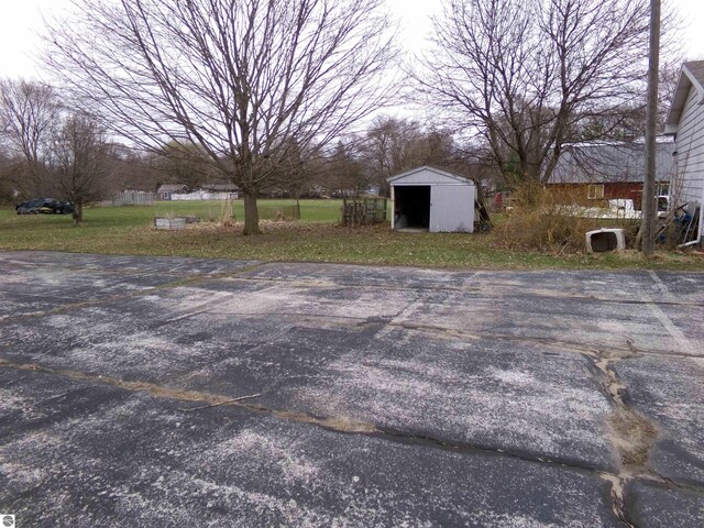 exterior space with a storage shed