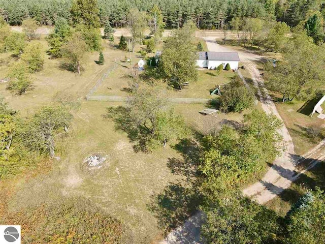 birds eye view of property with a rural view