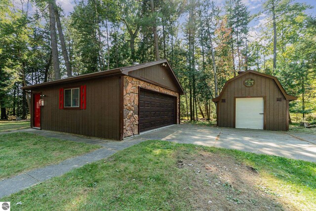 garage with a lawn