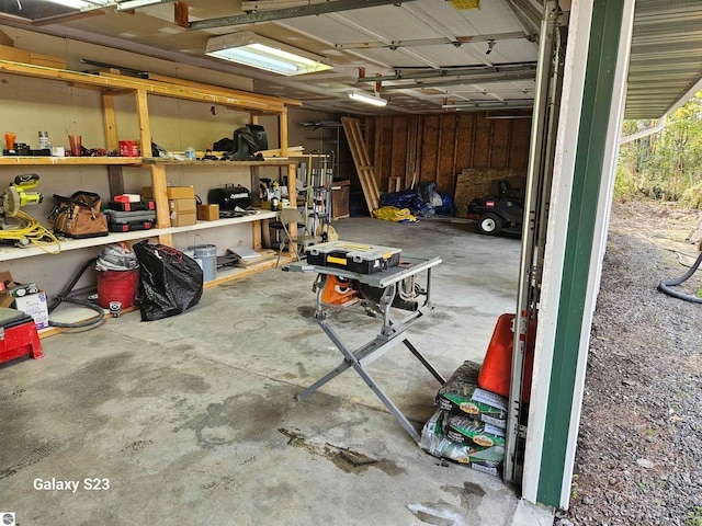 garage with a workshop area