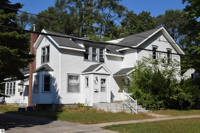 413 N Fancher St, Mount Pleasant, MI 48858 - view of front of home with roof with shingles