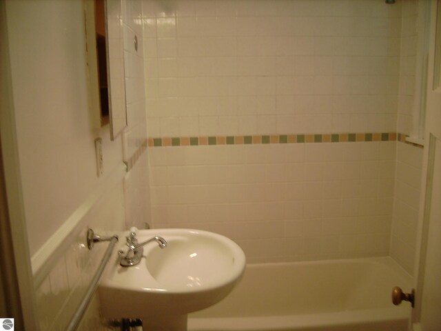 413 N Fancher St, Mount Pleasant, MI 48858 - bathroom with a bathtub, a shower, and a sink