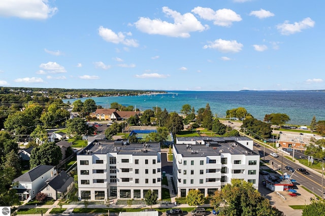 birds eye view of property featuring a water view