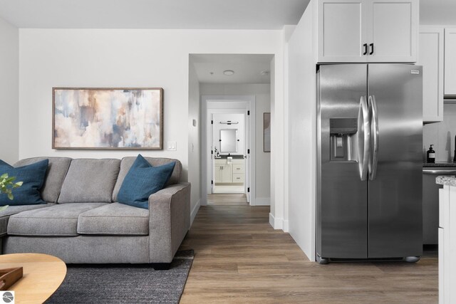 living room with wood-type flooring