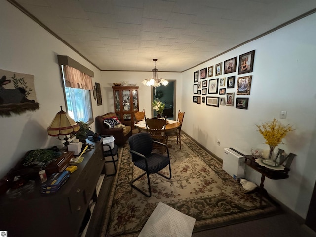 interior space with an inviting chandelier and crown molding