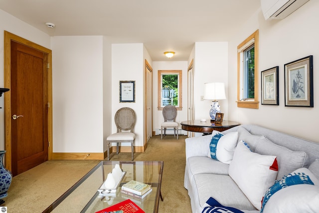 living room with light carpet, a baseboard heating unit, and an AC wall unit