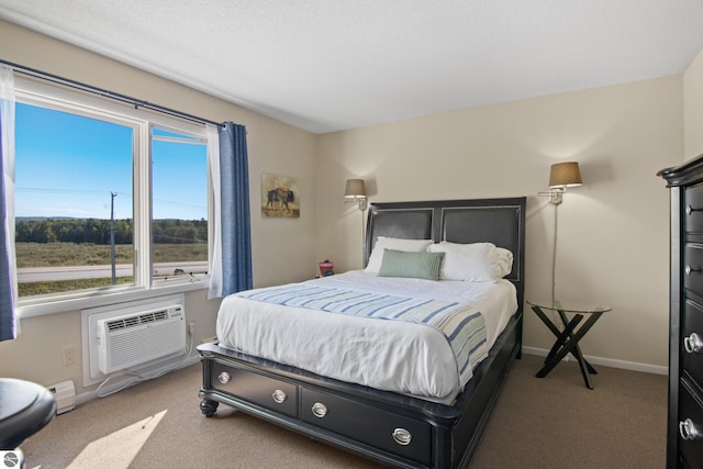 bedroom with light carpet and a wall unit AC