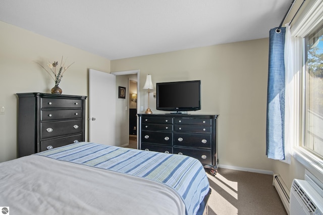 bedroom featuring dark colored carpet and a baseboard radiator