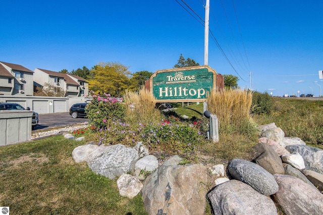 community sign with a garage