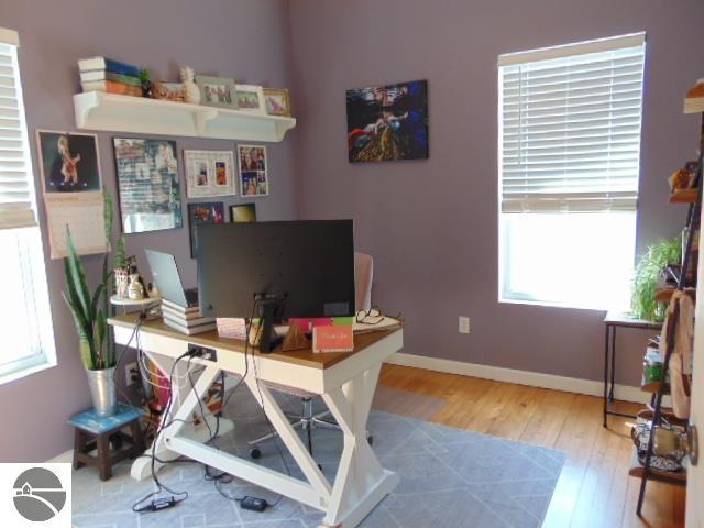 office space featuring hardwood / wood-style floors