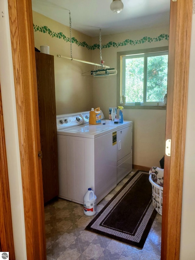 laundry area featuring washing machine and dryer