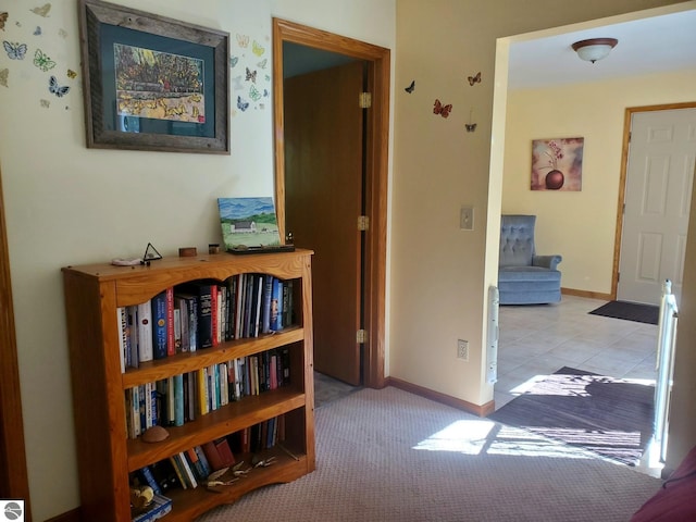 hallway with light carpet