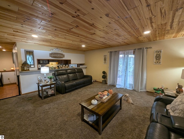 living room featuring carpet and wood ceiling