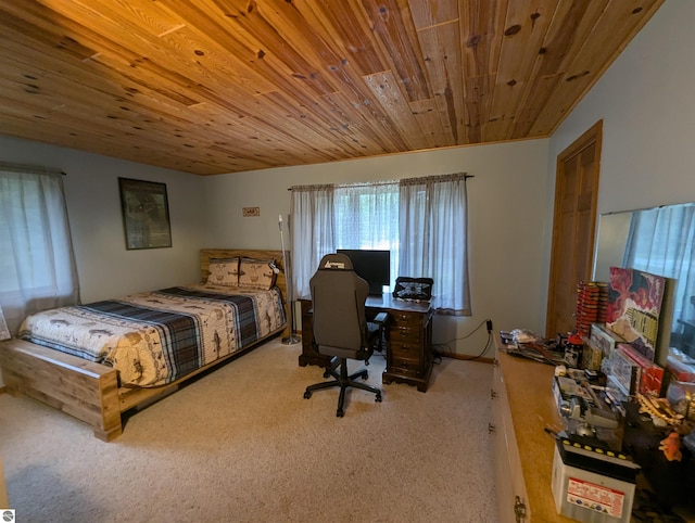 bedroom featuring wood ceiling and carpet flooring