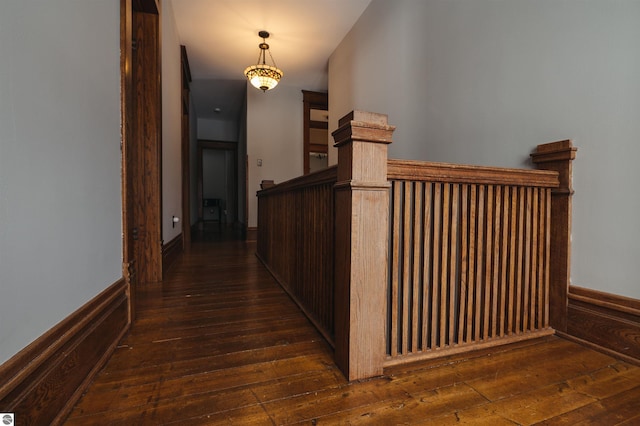 hallway featuring dark hardwood / wood-style floors