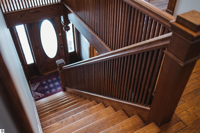 staircase featuring plenty of natural light