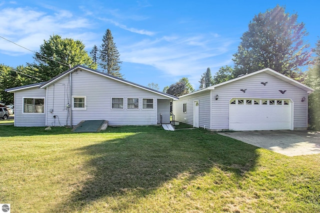 ranch-style house with a garage and a front lawn