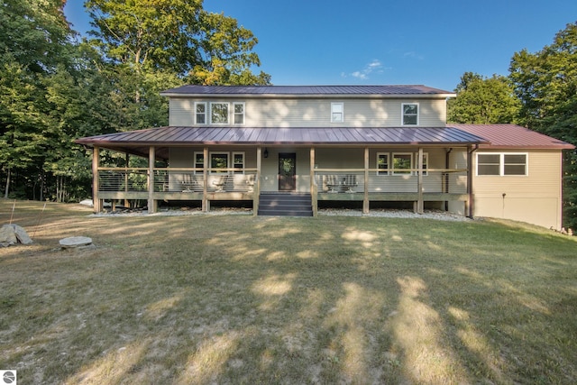 view of front of property with a front yard and a porch