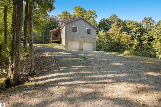 view of side of property featuring a garage