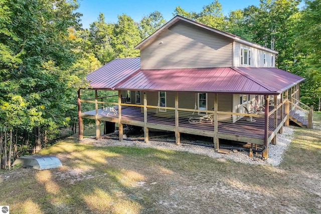 view of front of home featuring a wooden deck