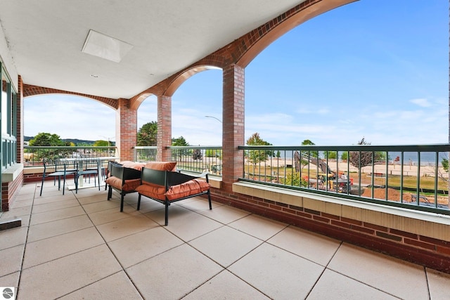 view of patio / terrace featuring a balcony