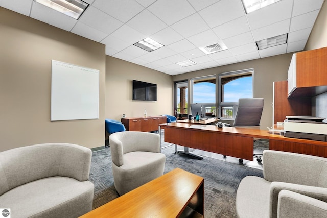 home office with a drop ceiling