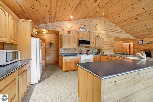 kitchen with lofted ceiling, wooden walls, wood ceiling, light brown cabinets, and white appliances